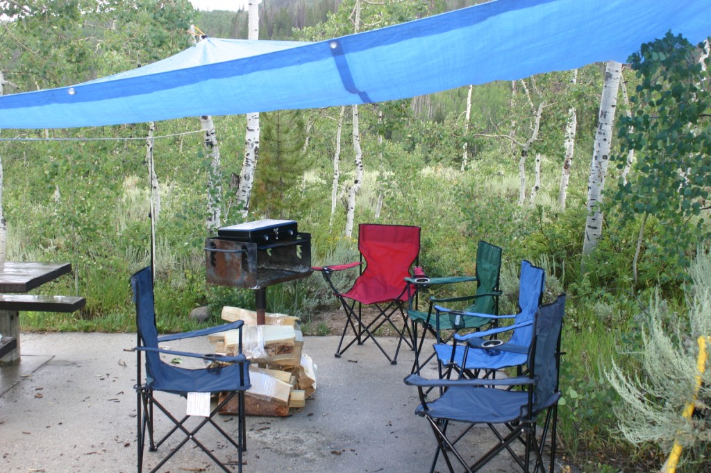 While everyone else stayed dry in the tent, I rigged some cover should we wish to actually be outdoors in the great outdoors. It took awhile for anyone to take me up on it. 